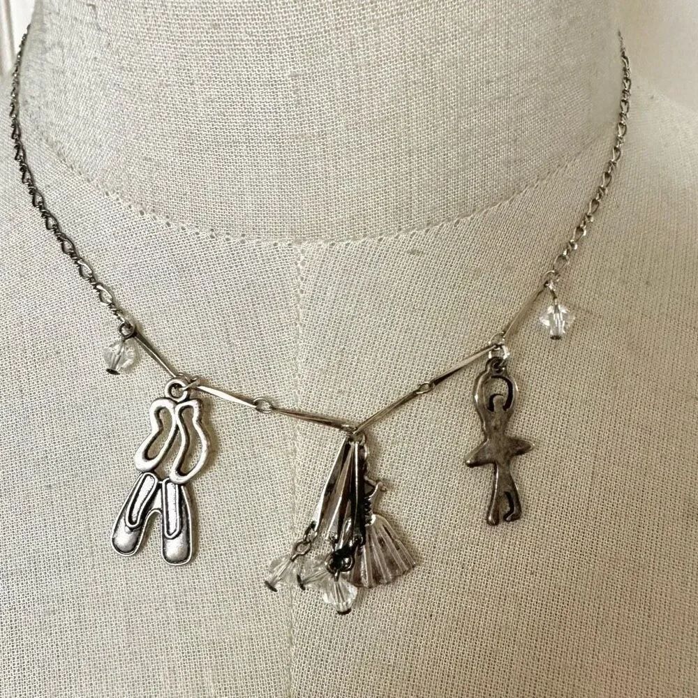 Silver tone ballerina charm necklace